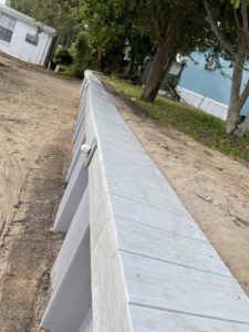 Retaining wall by Brine Marine of Tampa florida with a composite Cap